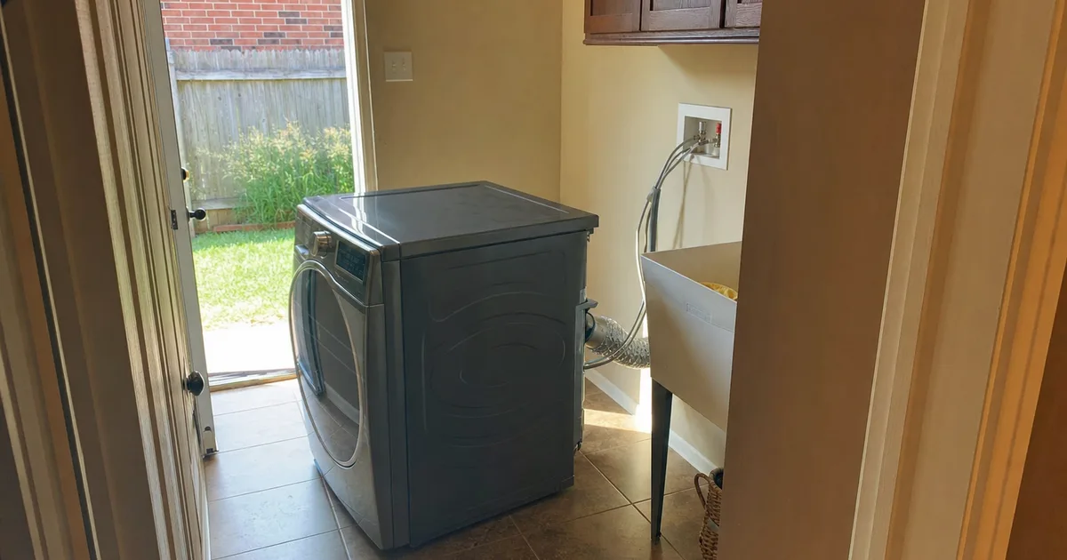 A Home Dryer Pulled Out From The Wall in Houston, TX